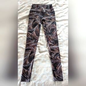 K-Deer Brown, White, And Black Patterned Leggings. Size Medium. Legging Length.